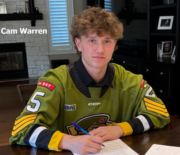 Top pick Warren signs