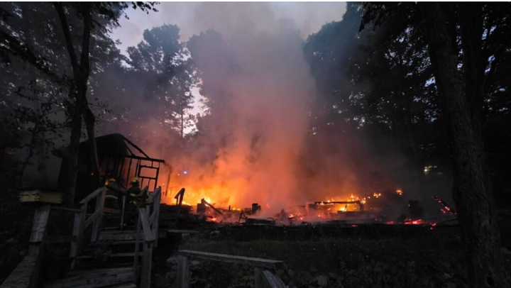 Cottage and bunkhouse on Trout Lake destroyed by fire