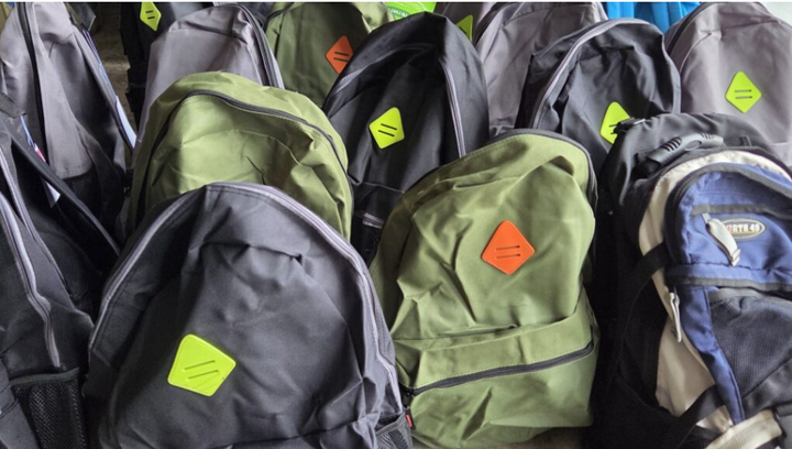 Just over 100 backpacks of donated essential items distributed