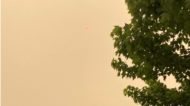 Wildfire smoke hazing up the sky